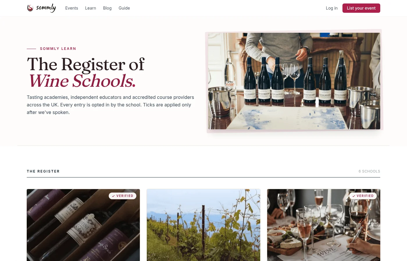 The public Register of Wine Schools page at /learn/schools, with a hero image and a grid of school listings below